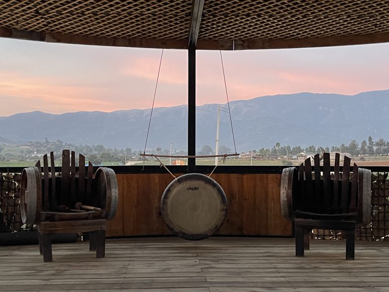 Deck with a gong and mountain views at Iboga Treatment Center in Ensenada, Mexico