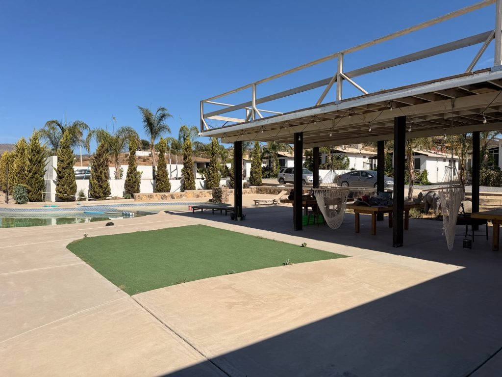 Lawn and covered deck at Iboga Treatment Center in Ensenada, Mexico