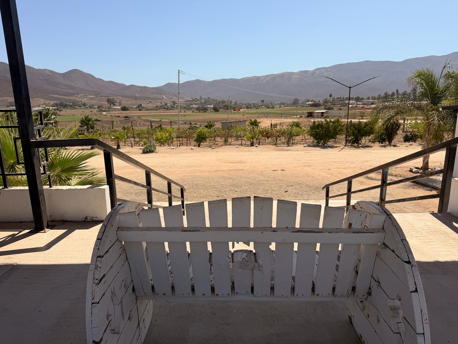 Quiet terrace overlooking the valley and mountains at Iboga Treatment Center in Ensenada, Mexico